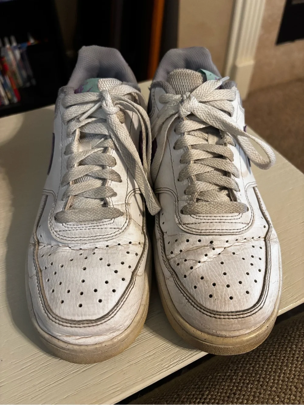 Nike Women’s White Sneakers with Purple Swoosh